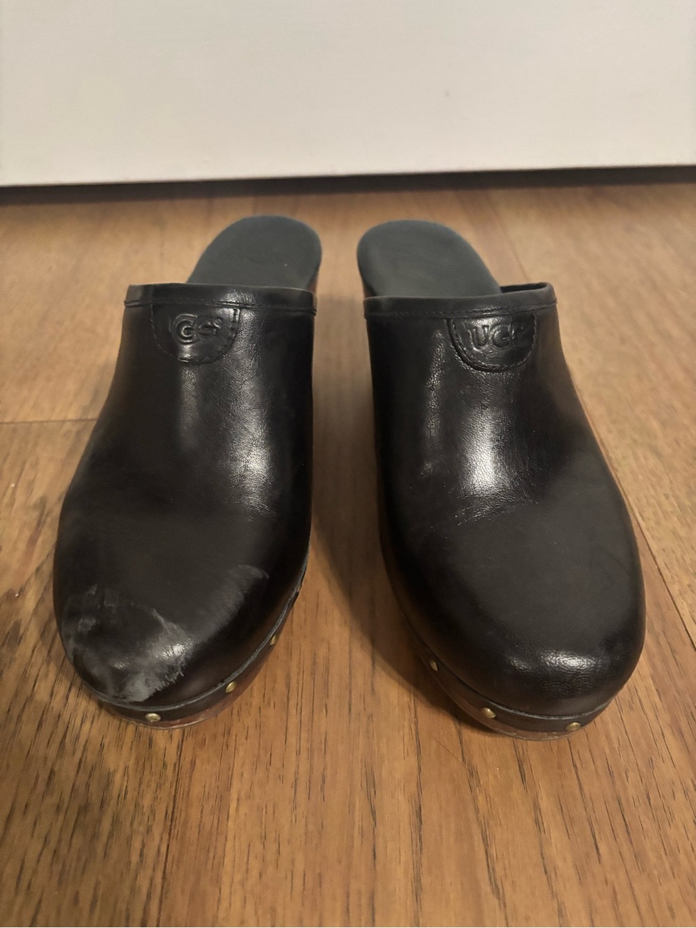 UGG Women’s Black Leather Slip-On Clogs